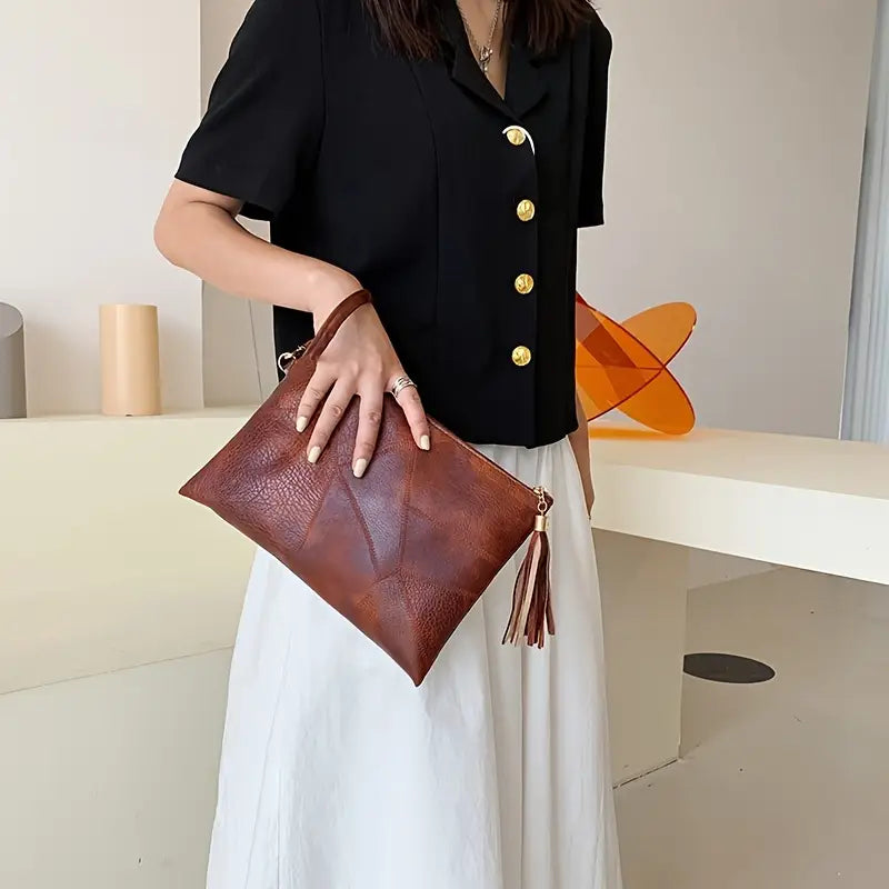 Cartera de mano con diseño retro texturizado